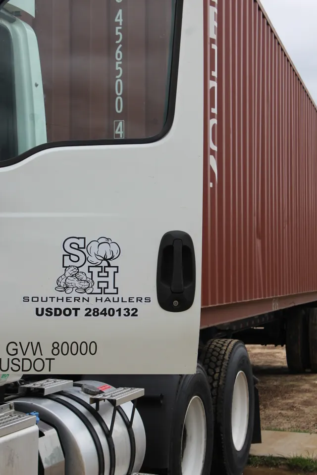 Southern Haulers tractor day-cab in white at the yard line, 2024